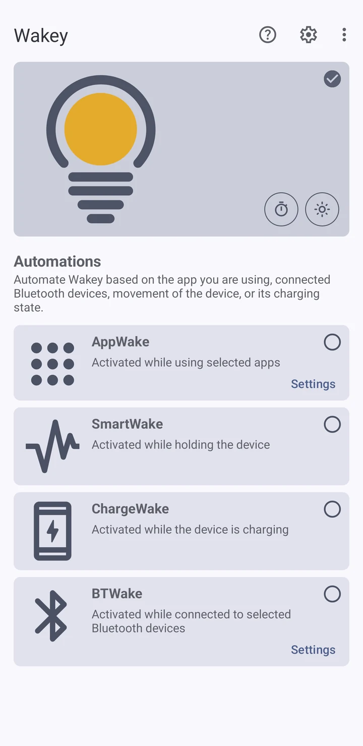 Wakey's main screen in light theme: the bulb is switched on, with AppWake, SmartWake, ChargeWake and BTWake listed underneath.